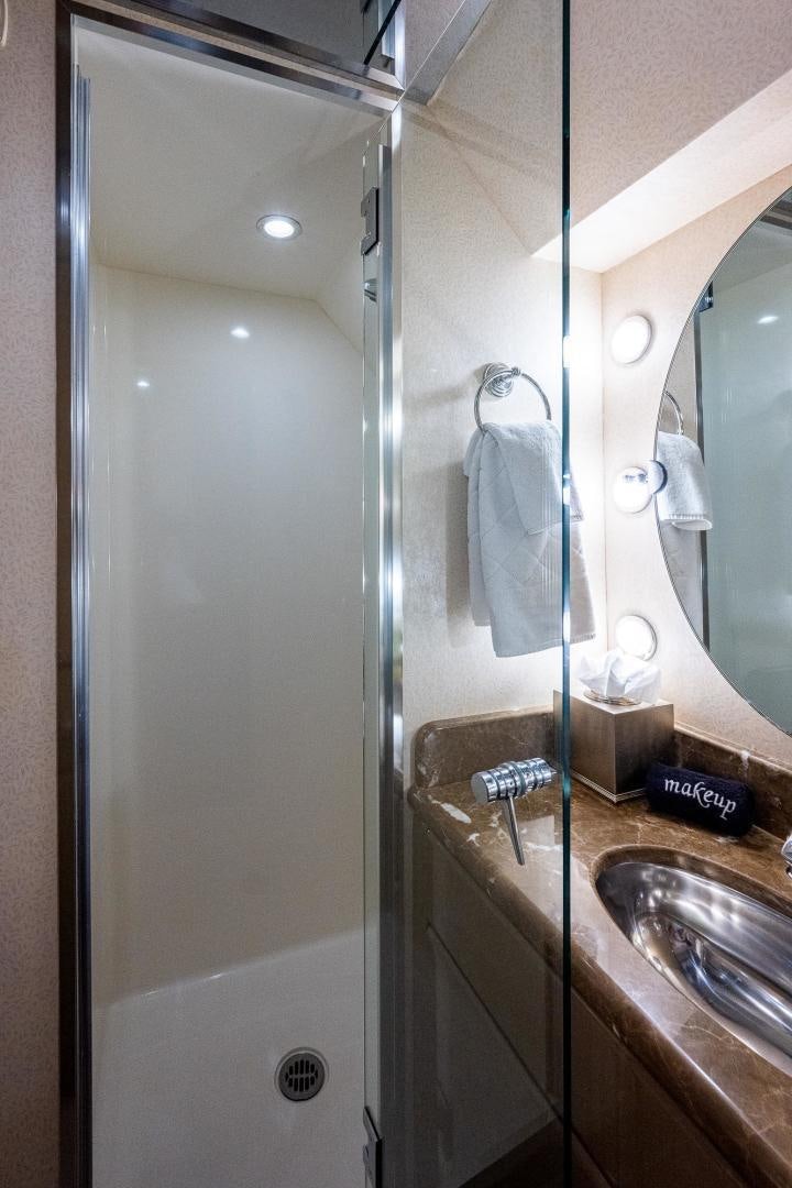 a bathroom with a shower and sink aboard ATLANTIC Yacht for Sale