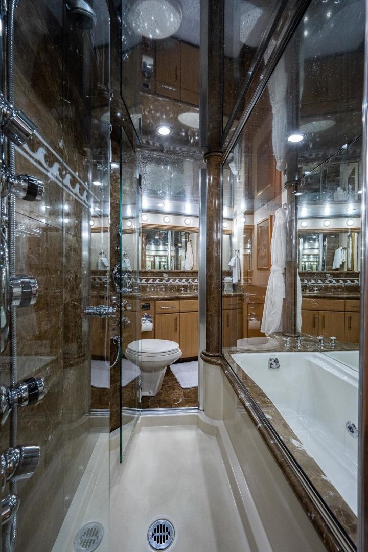 a bathroom with a tub and toilet aboard ATLANTIC Yacht for Sale