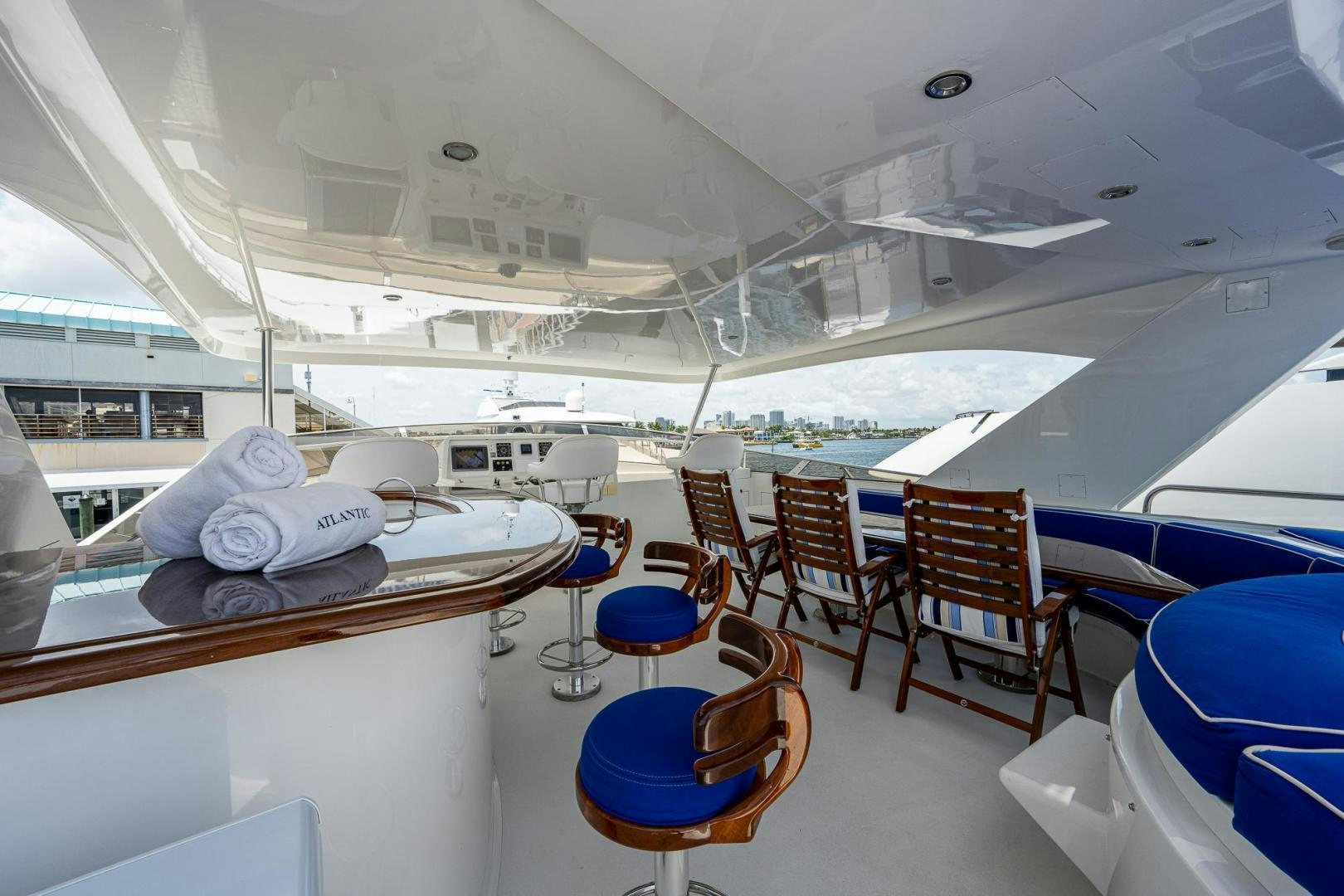 a room with tables and chairs aboard ATLANTIC Yacht for Sale