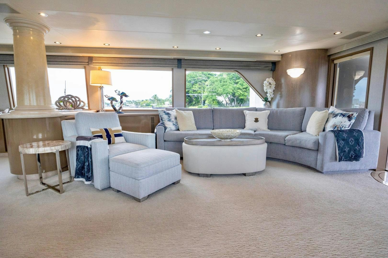 a living room with a couch and a table aboard ATLANTIC Yacht for Sale