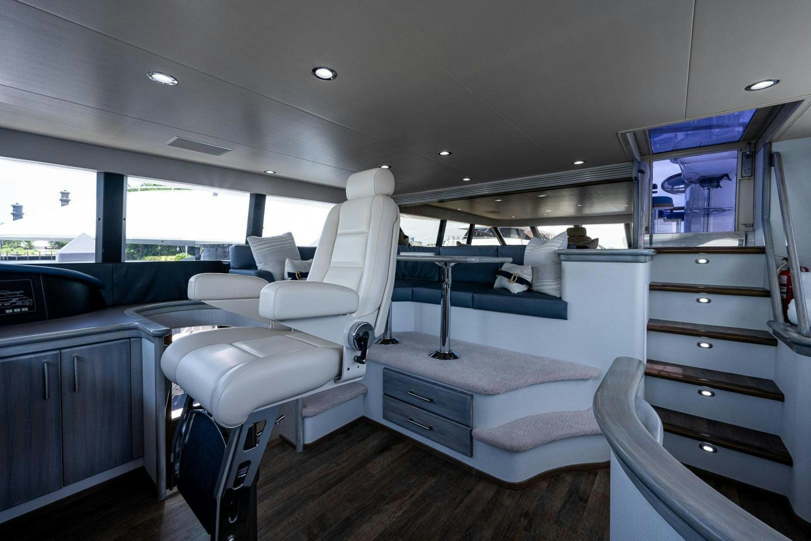 a vehicle with a desk and chairs aboard ATLANTIC Yacht for Sale