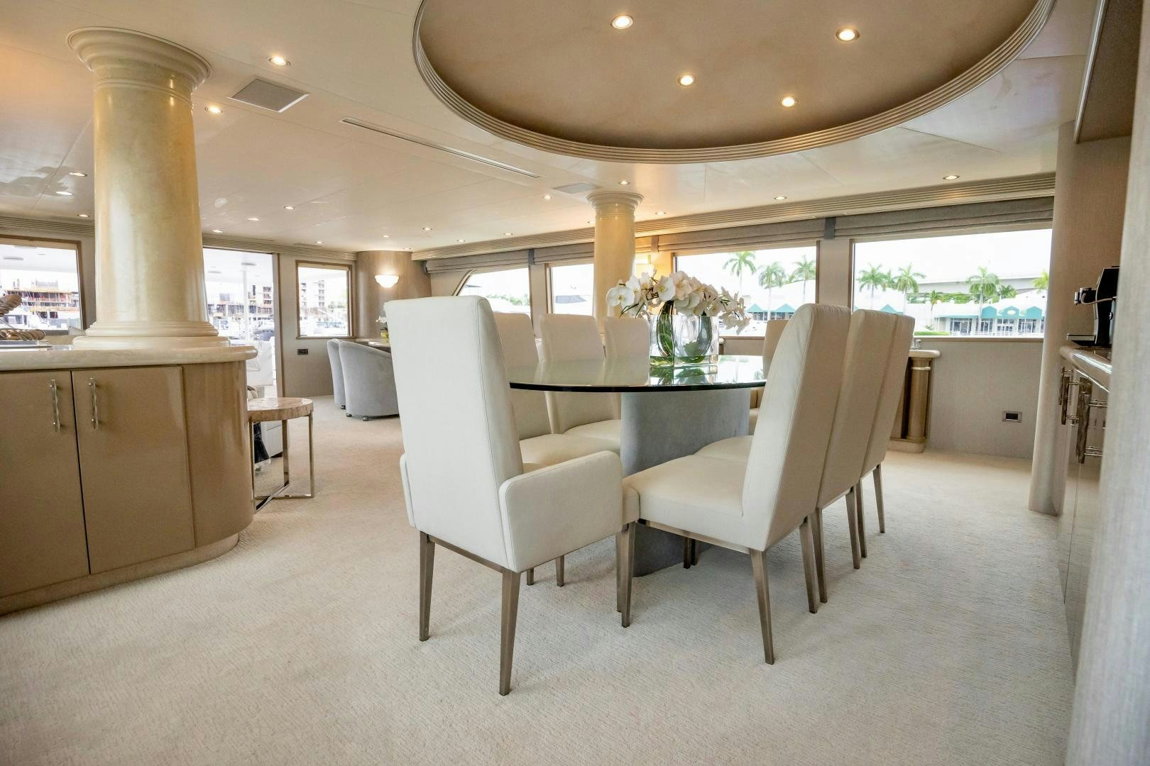 a room with a table and chairs aboard ATLANTIC Yacht for Sale