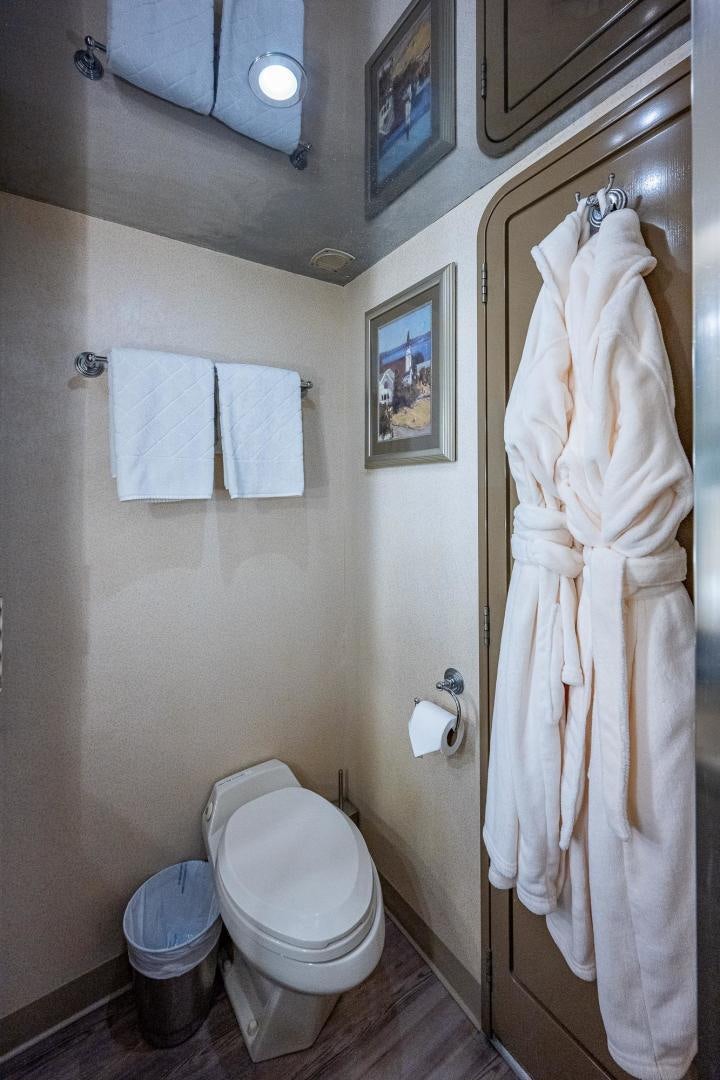 a bathroom with towels on the wall aboard ATLANTIC Yacht for Sale