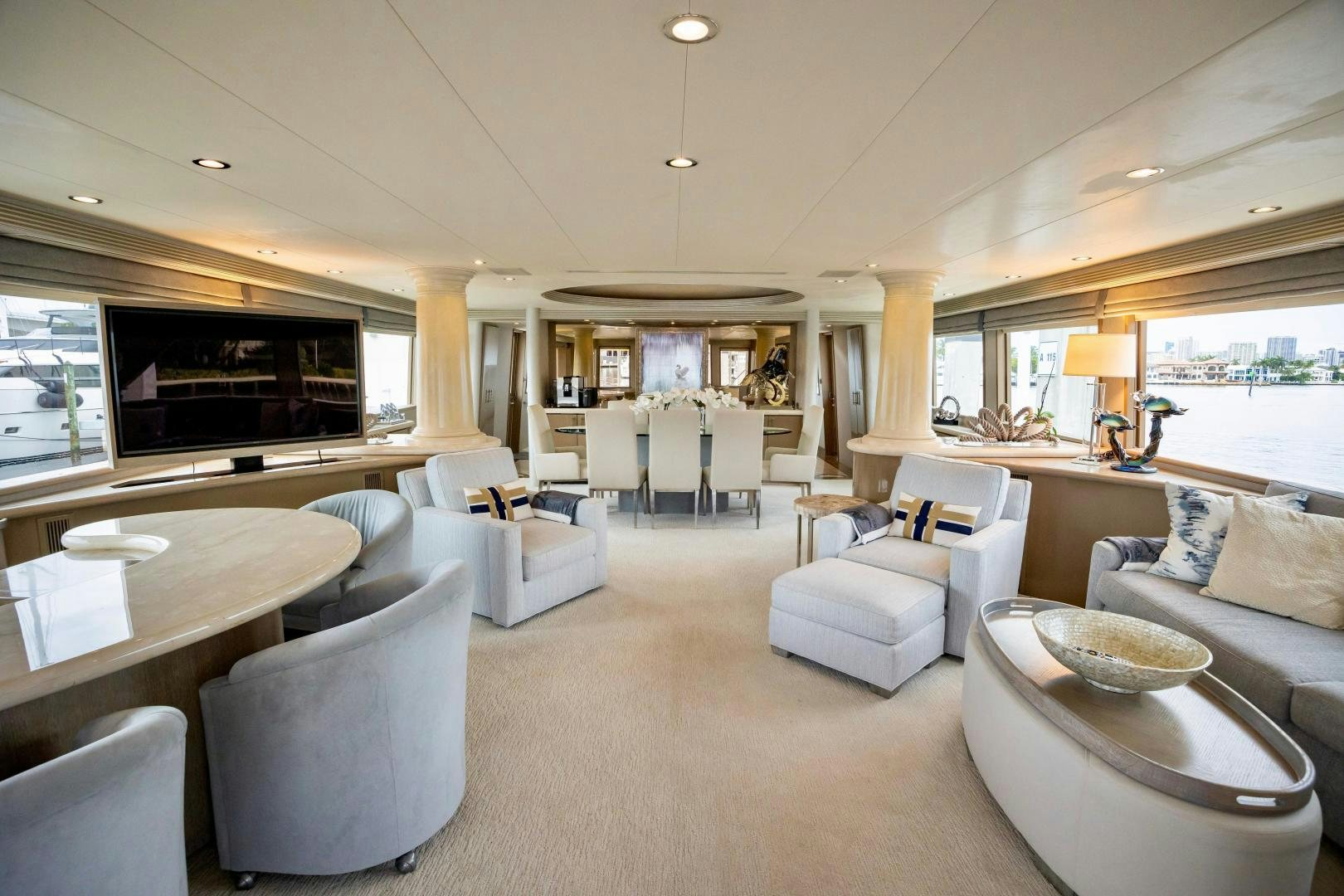 a living room with a large kitchen and dining area aboard ATLANTIC Yacht for Sale