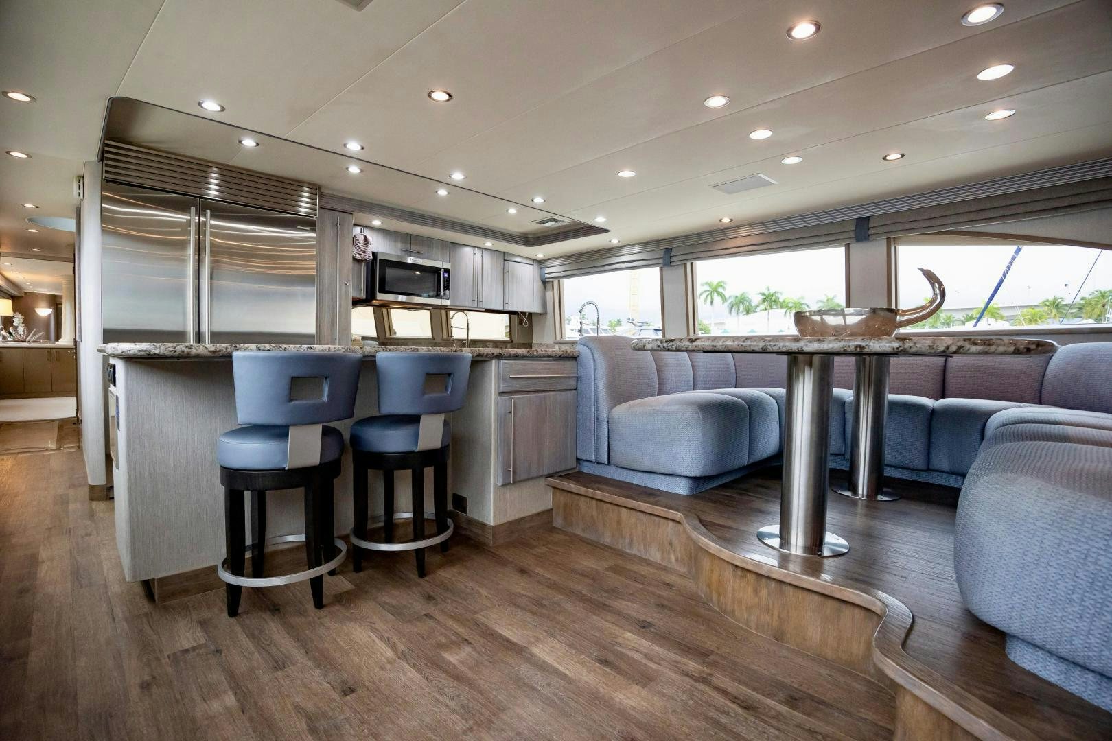 a large kitchen and living room aboard ATLANTIC Yacht for Sale