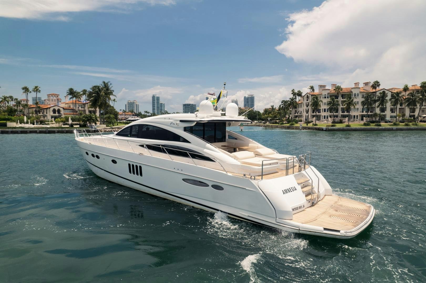 a white yacht in the water aboard AMNESIA Yacht for Sale