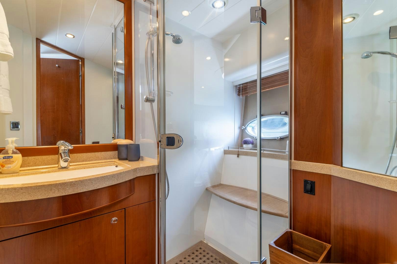a bathroom with a stand up shower aboard AMNESIA Yacht for Sale