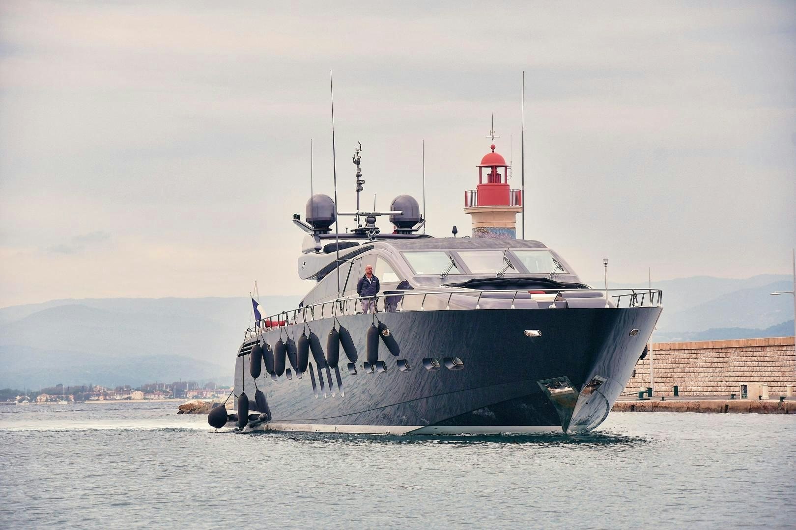 a boat with a lighthouse on it aboard OSE Yacht for Sale