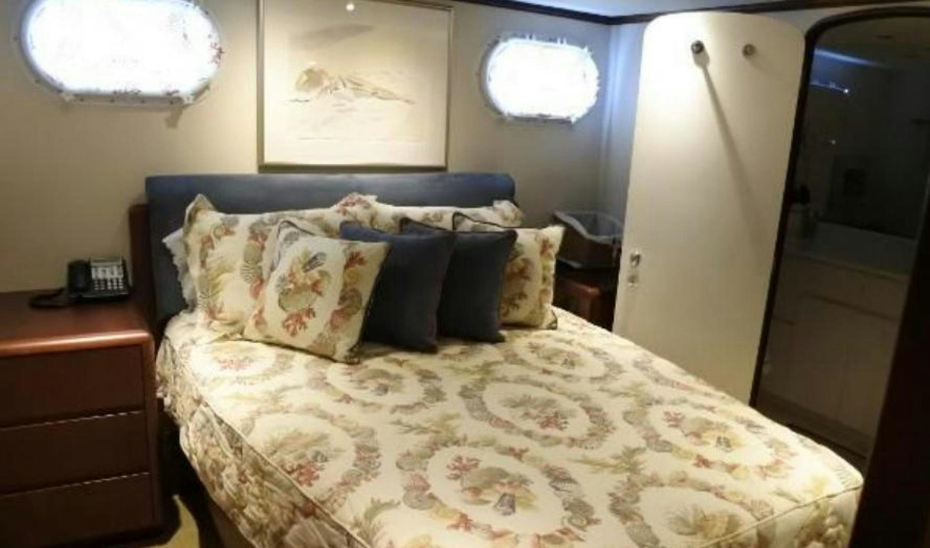a bed with pillows aboard MY LADY ALASKA Yacht for Sale
