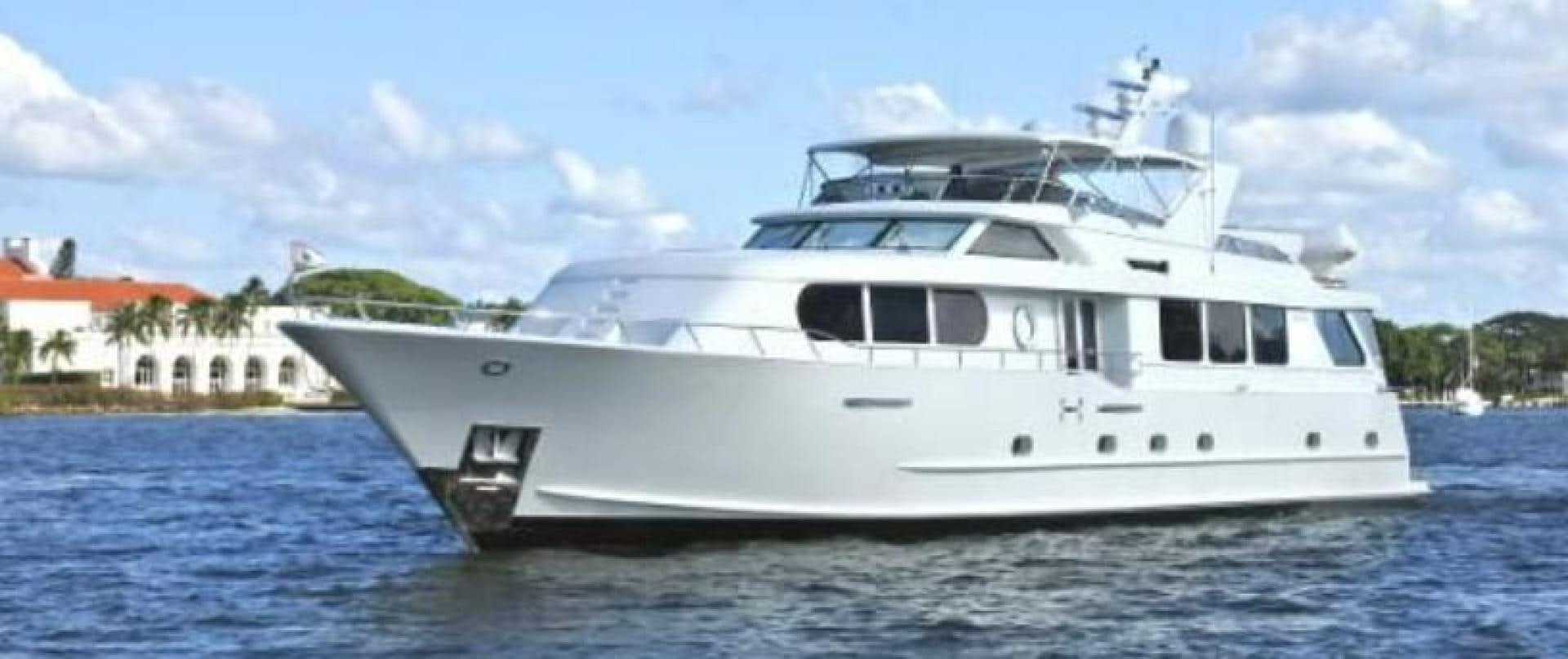 a white yacht on the water aboard MY LADY ALASKA Yacht for Sale