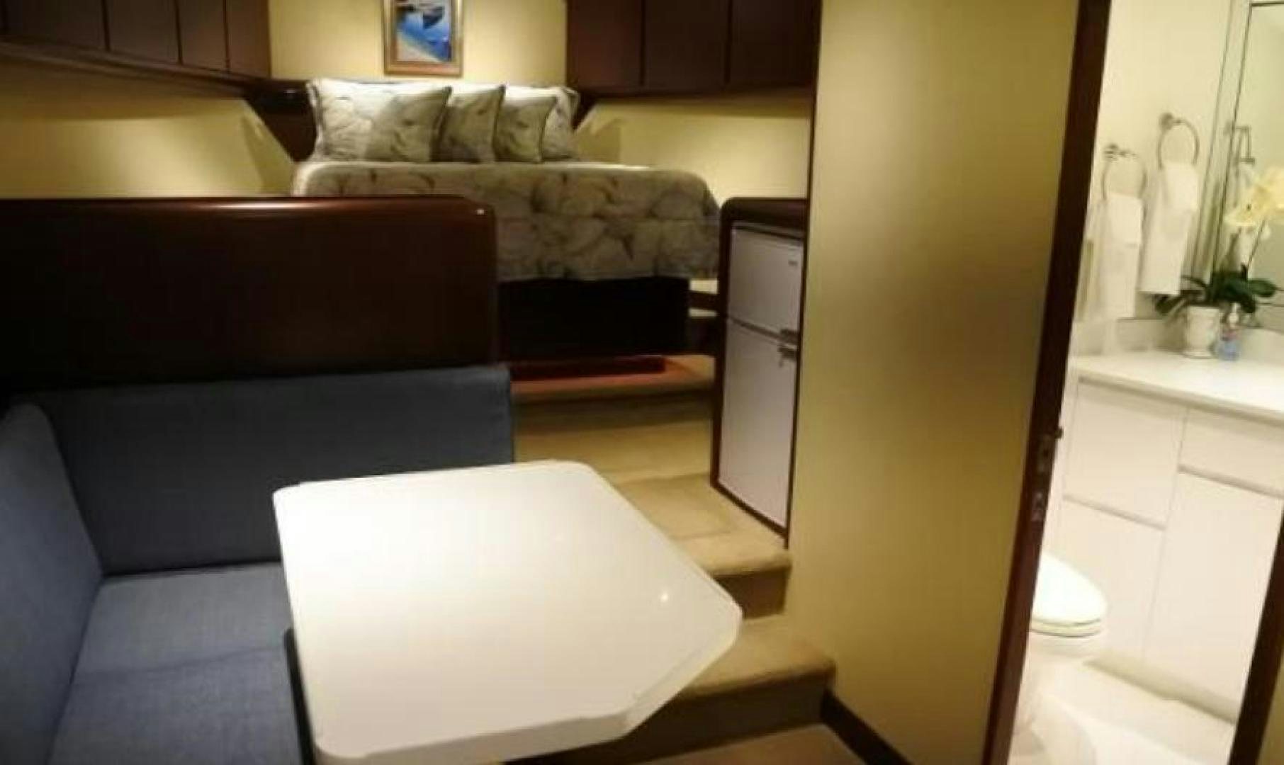 a living room with a couch and a table aboard MY LADY ALASKA Yacht for Sale