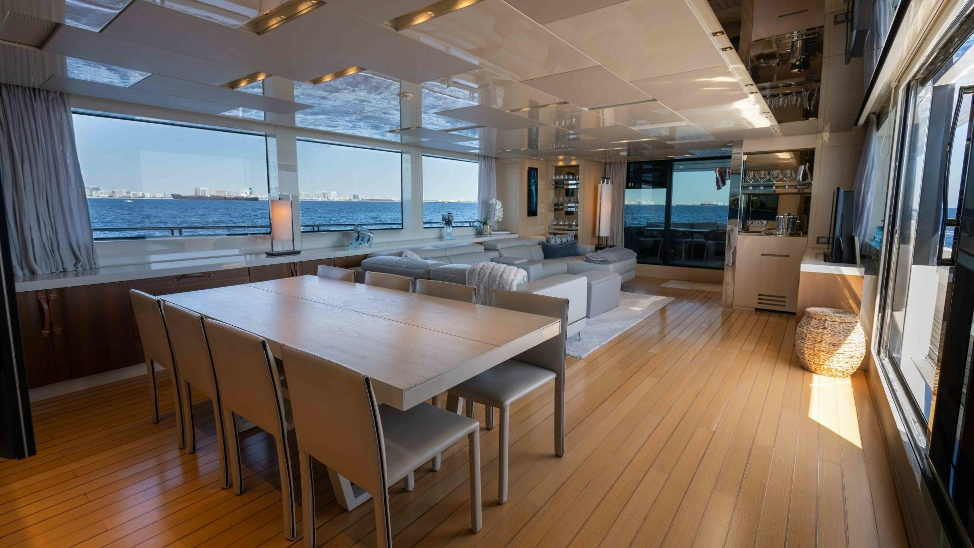 a room with a table and chairs aboard NOTORIOUS Yacht for Sale
