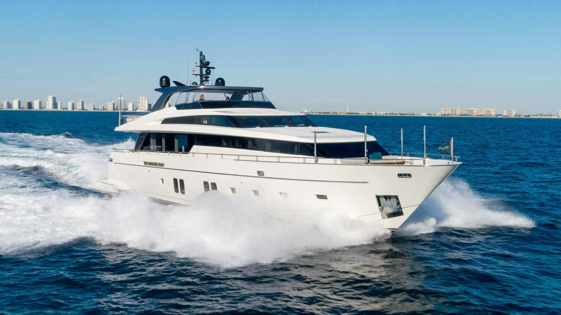 a white boat on the water aboard NOTORIOUS Yacht for Sale