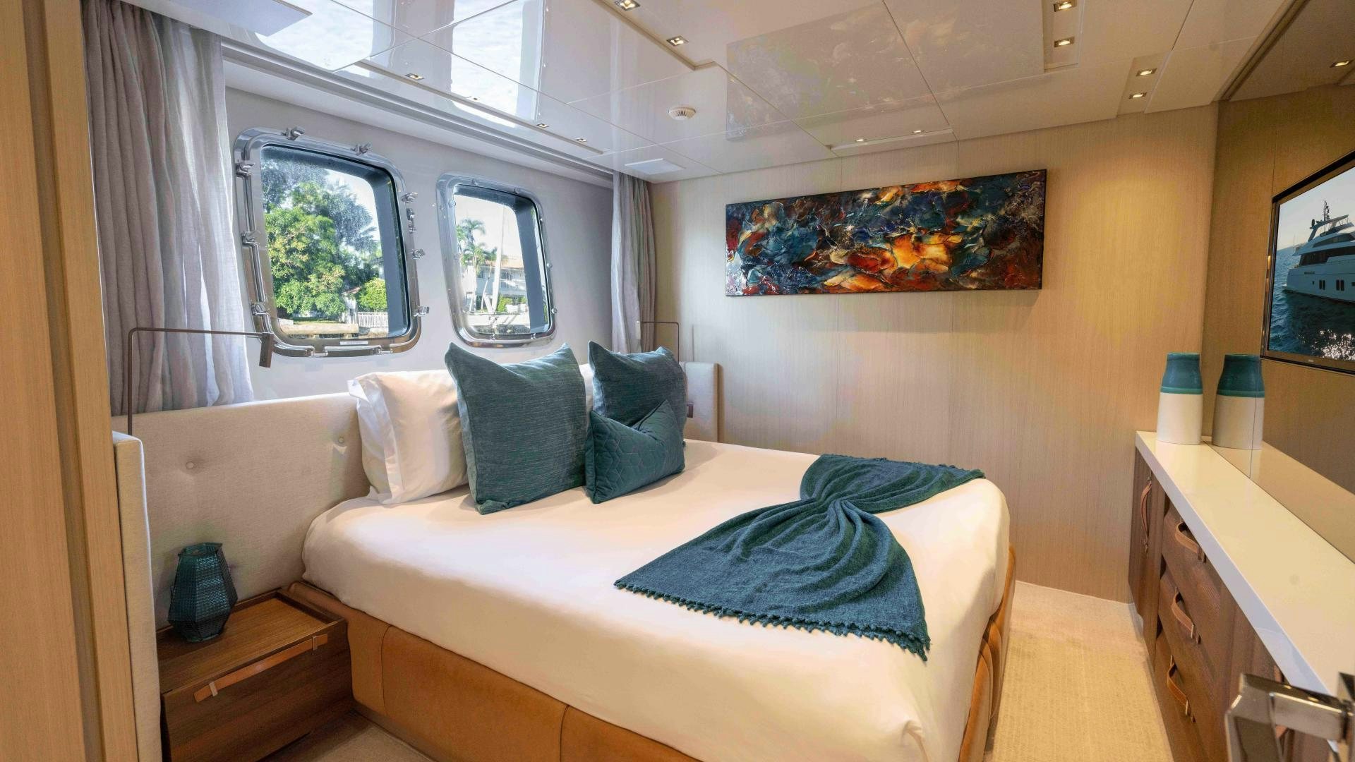 a bed in a room aboard NOTORIOUS Yacht for Sale
