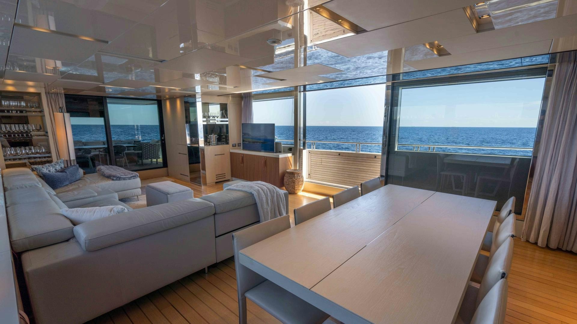 a living room with a large window aboard NOTORIOUS Yacht for Sale