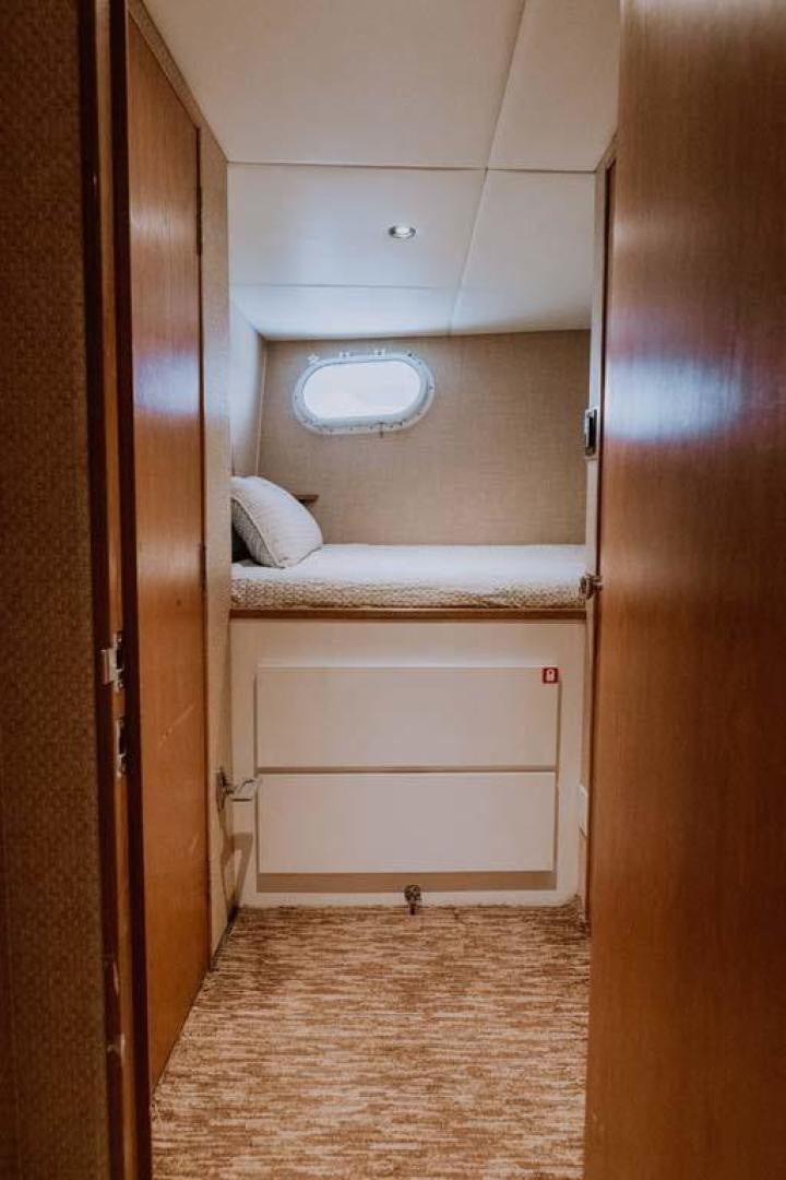a small white bathroom aboard SKY Yacht for Sale