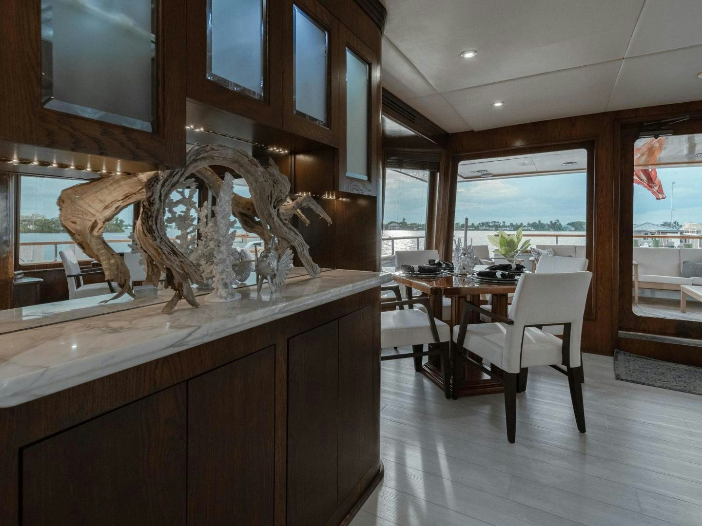 a kitchen with a large island aboard SKY Yacht for Sale