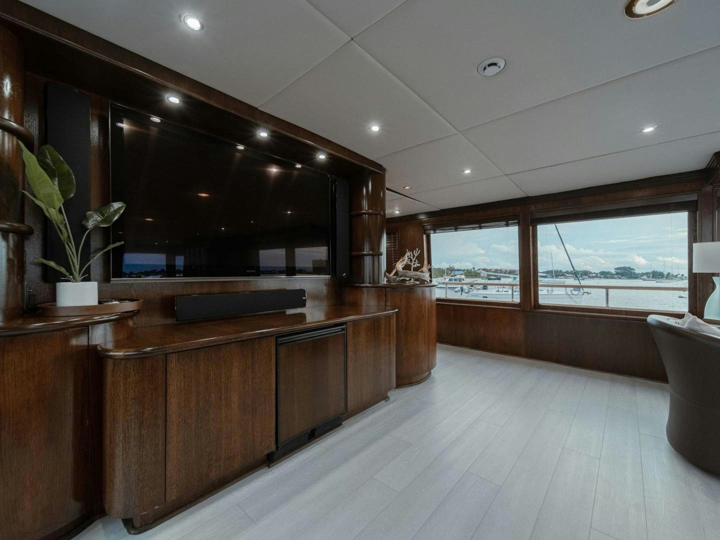 a large kitchen with a large island aboard SKY Yacht for Sale