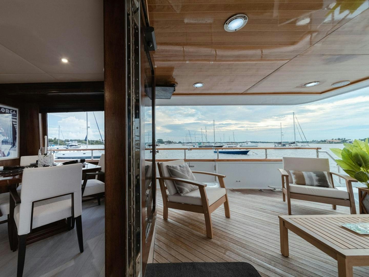 a room with a view of the ocean and the beach aboard SKY Yacht for Sale