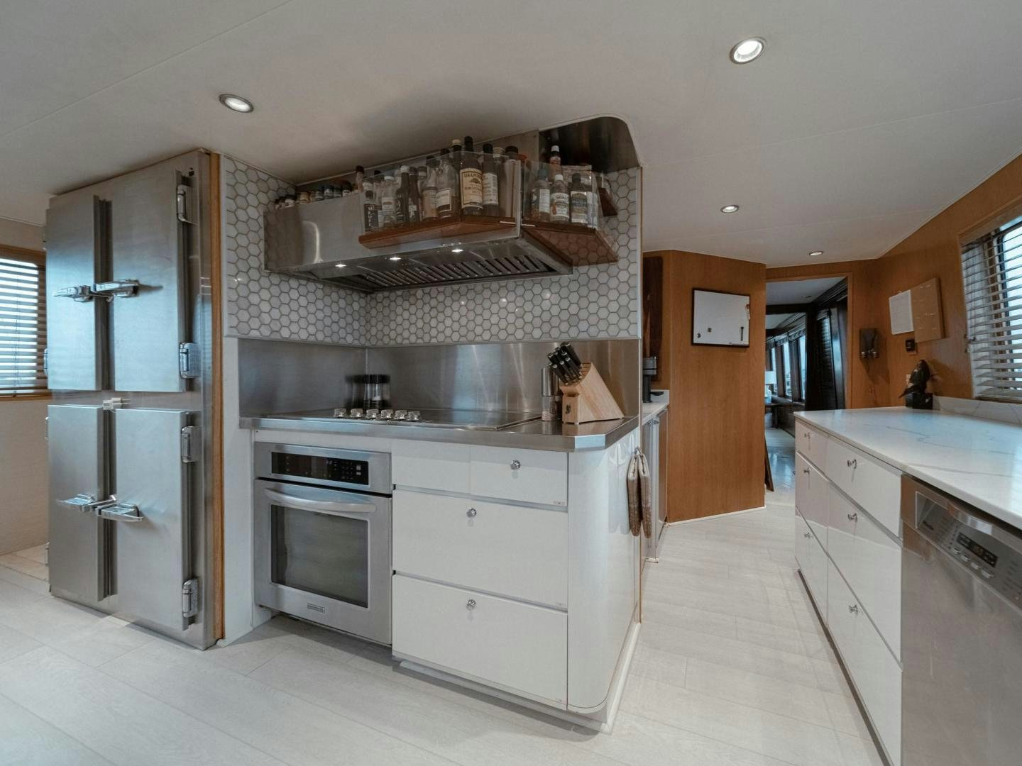 a kitchen with a large oven aboard SKY Yacht for Sale