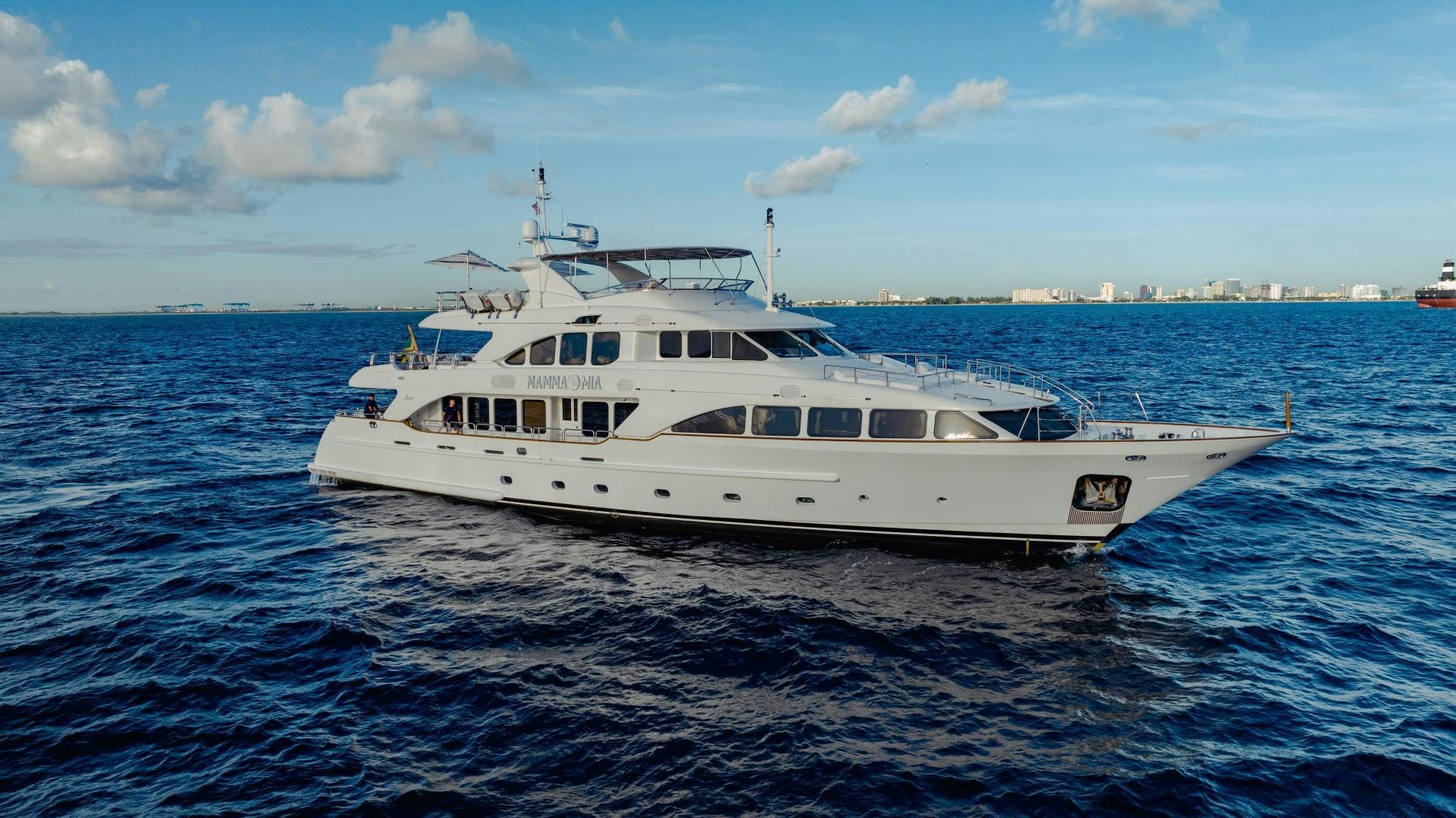 a white boat in the water aboard MAMMA MIA Yacht for Sale
