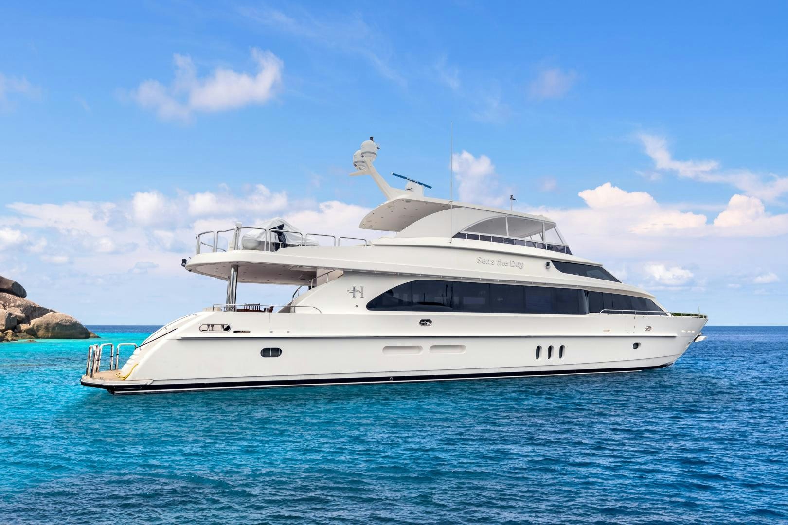 a white yacht in the water aboard SEAS THE DAY Yacht for Sale