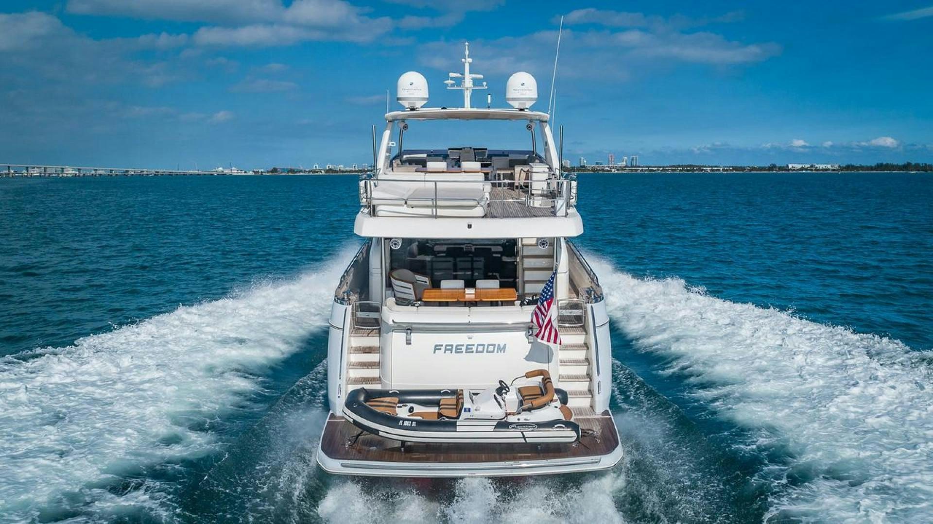 a boat on the water aboard FREEDOM Yacht for Sale