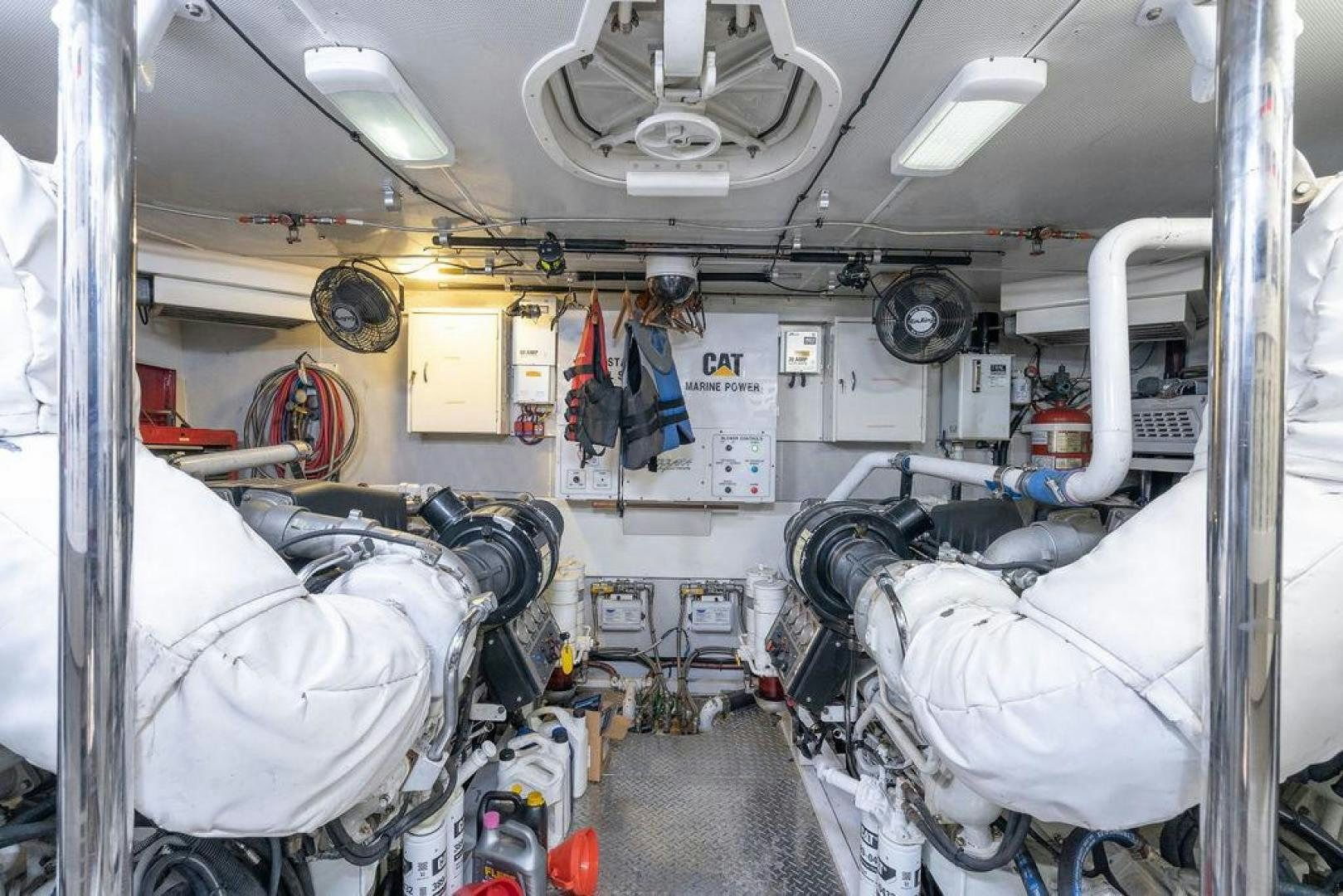 a room with a large white machine aboard CHIP Yacht for Sale