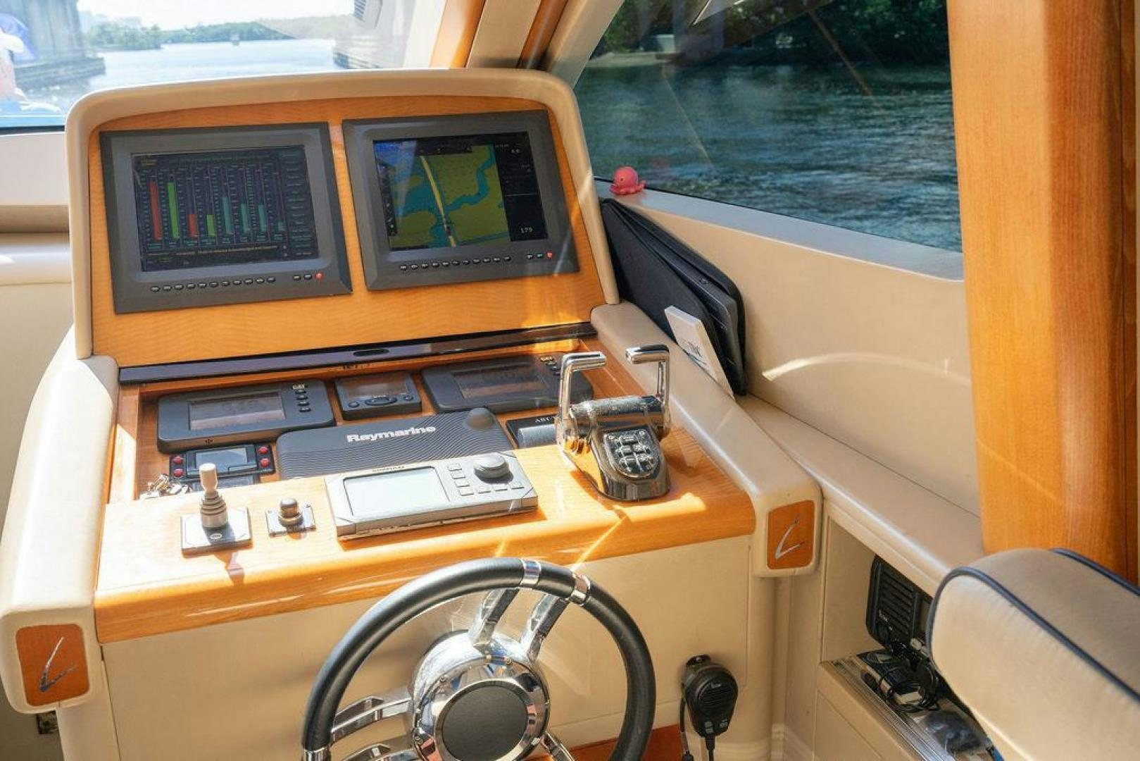 a yellow vehicle with a screen aboard CHIP Yacht for Sale