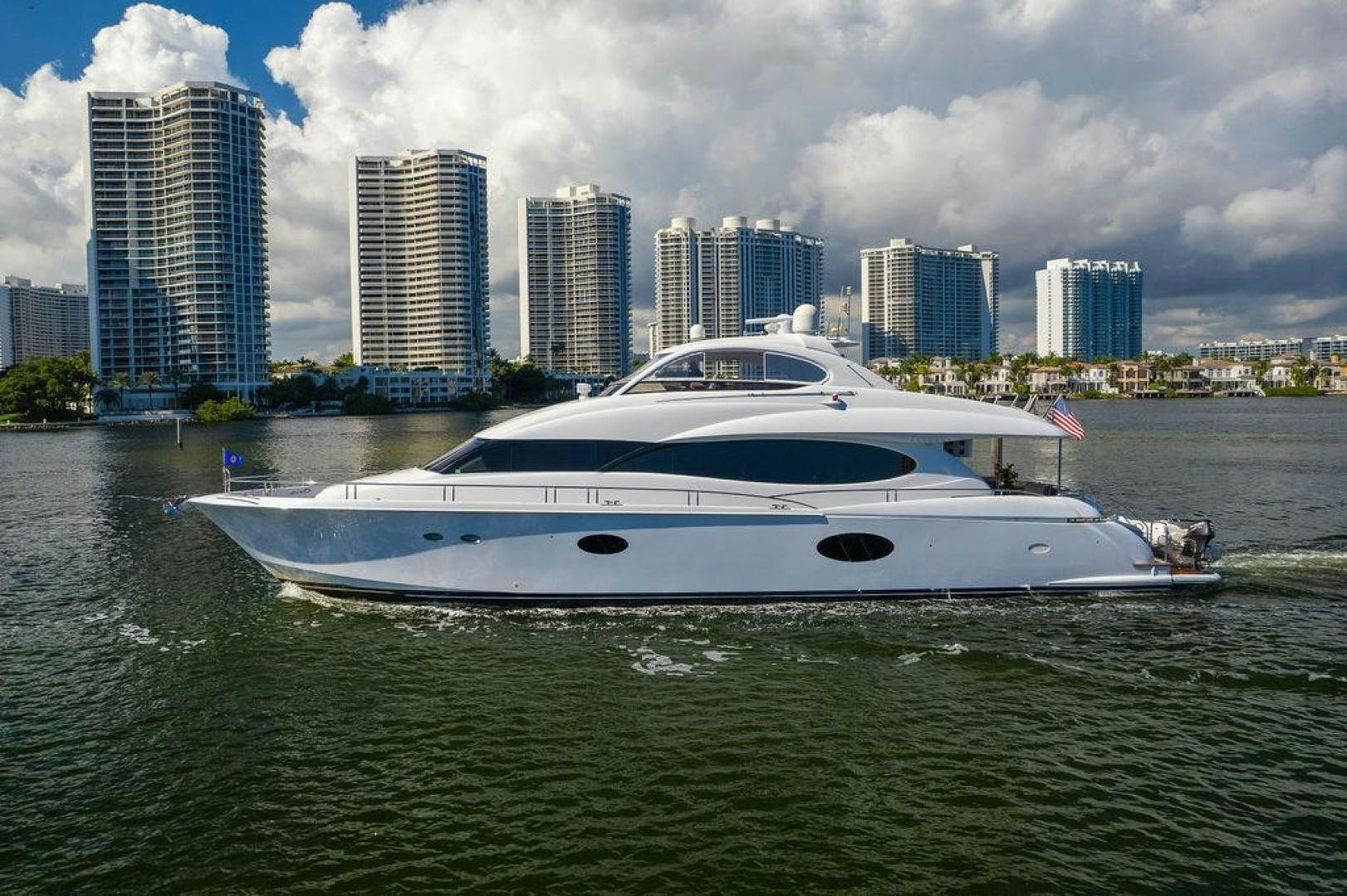 a white yacht in the water aboard CHIP Yacht for Sale