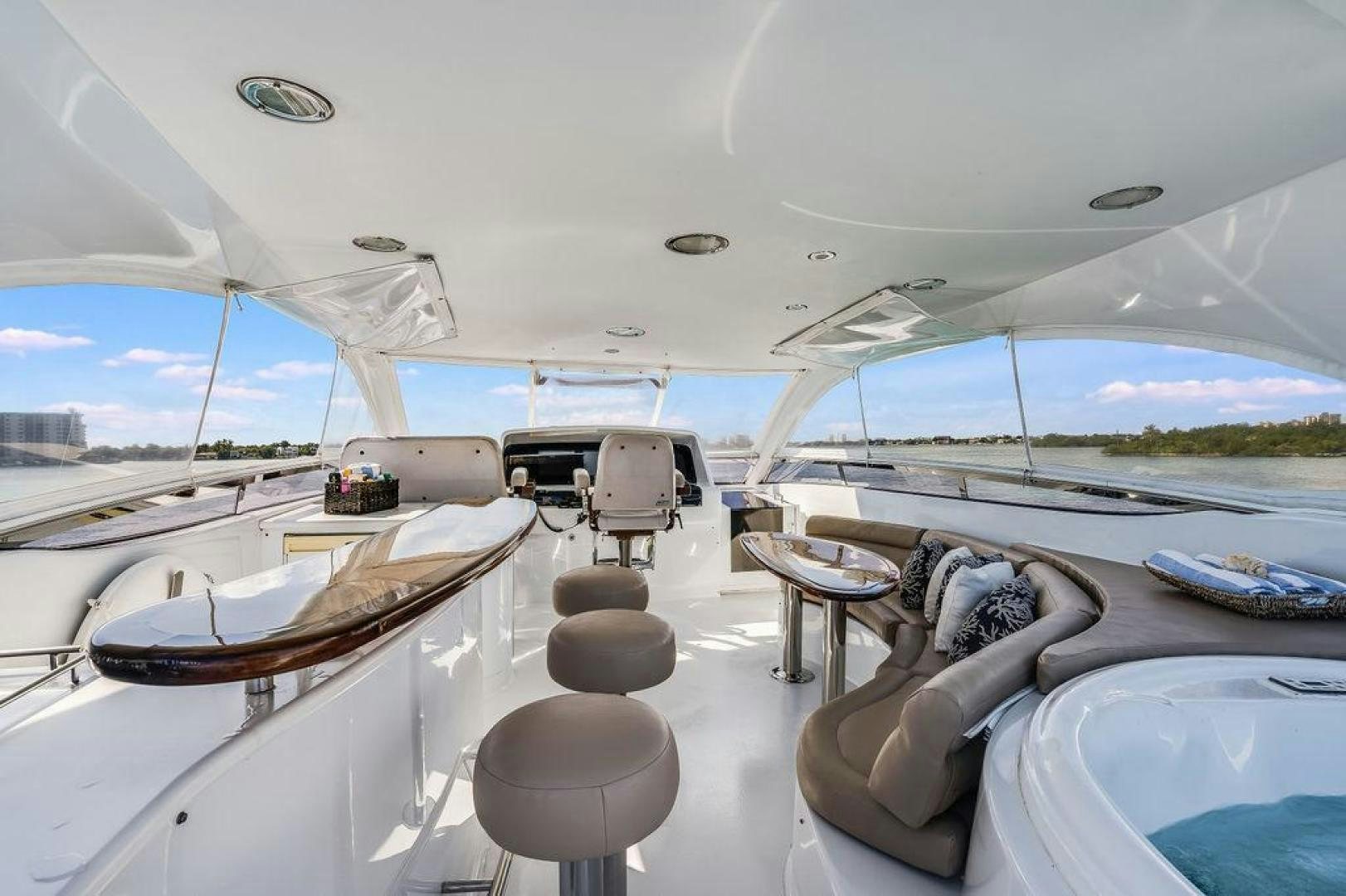 a room with a view of the water and the land below aboard CHIP Yacht for Sale