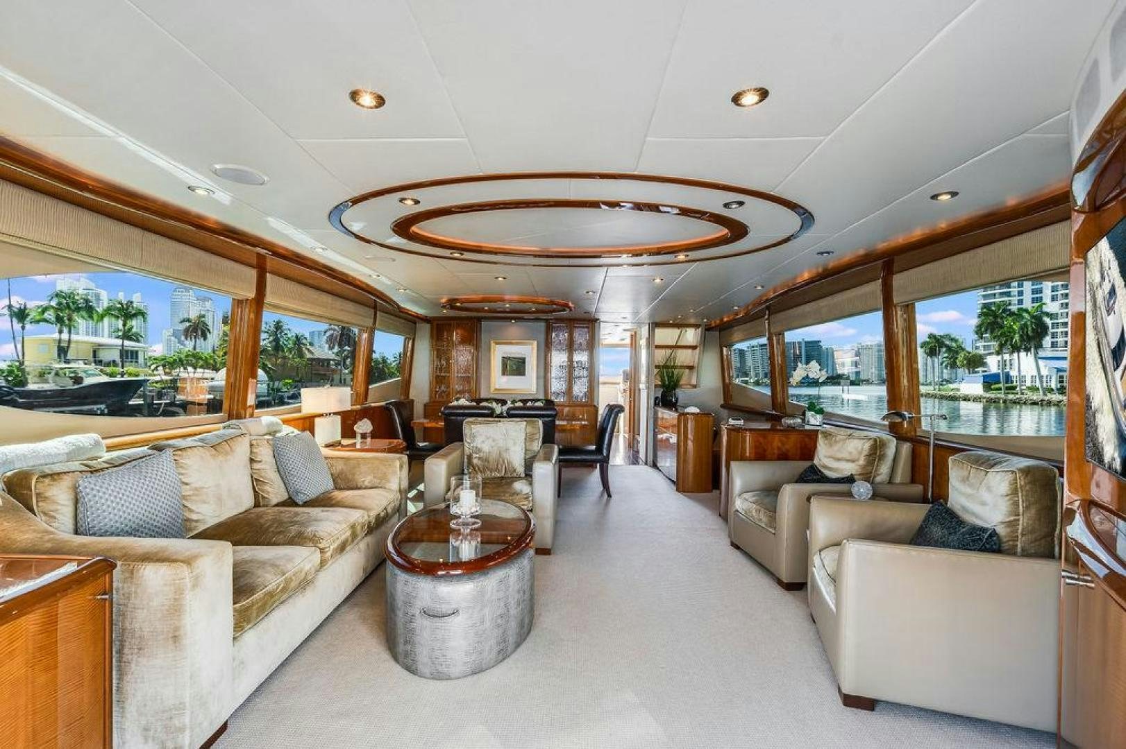 a living room with a large window aboard CHIP Yacht for Sale
