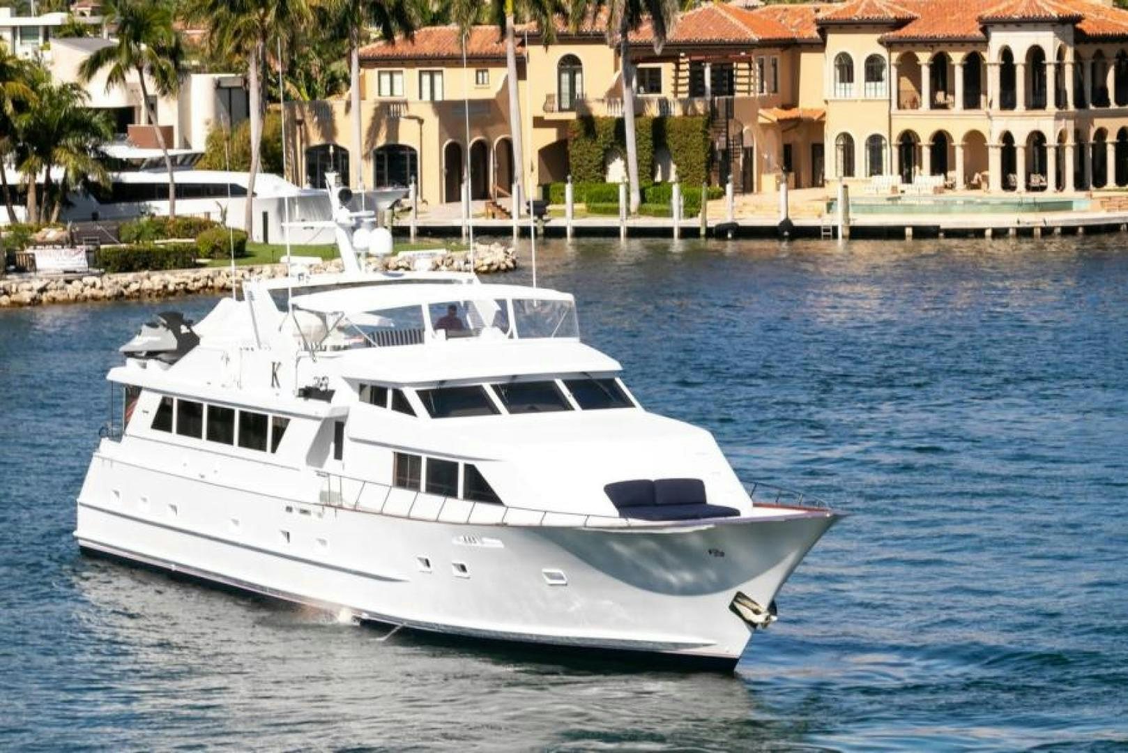 a white boat on the water aboard K Yacht for Sale