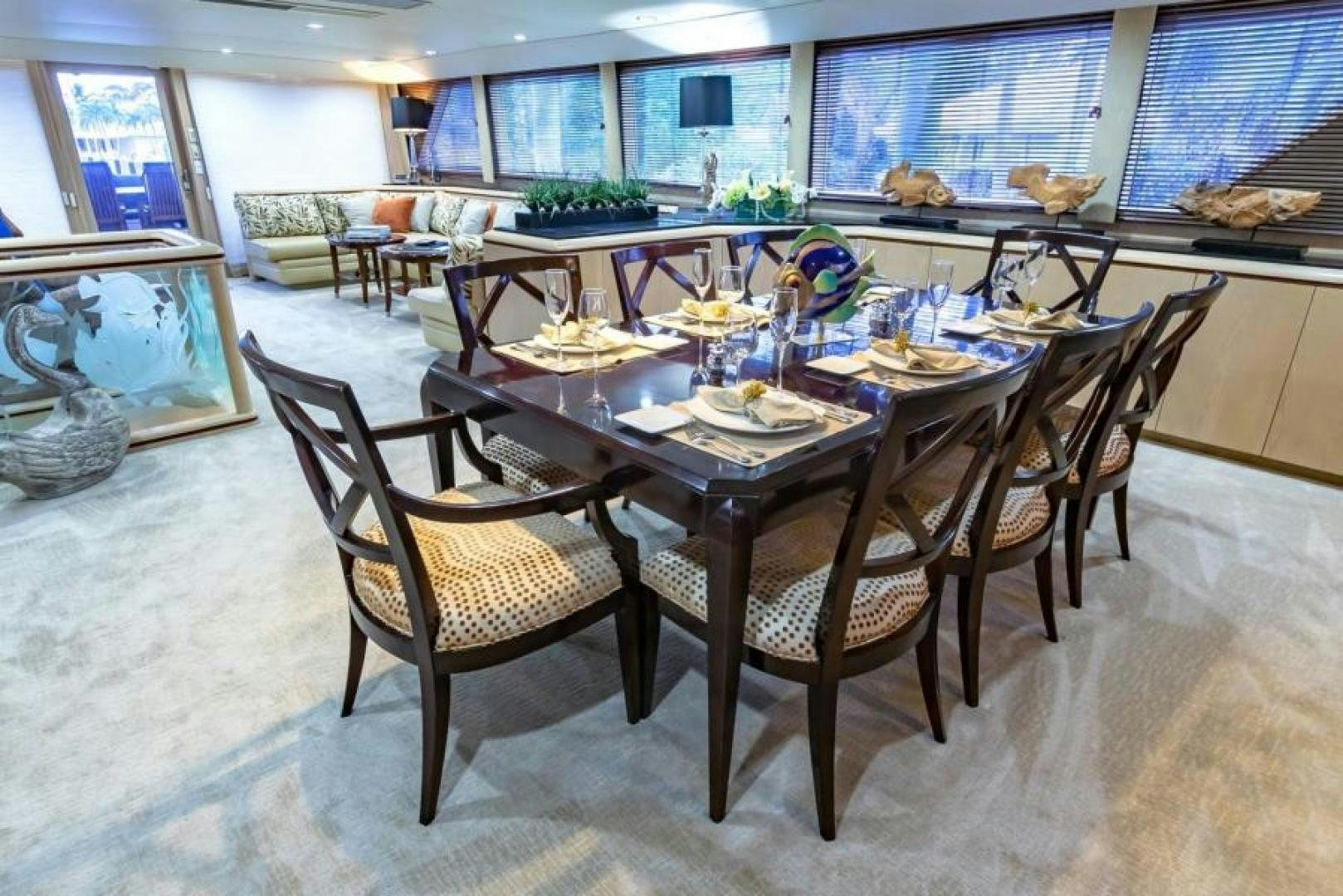 a dining room table set for a meal aboard K Yacht for Sale