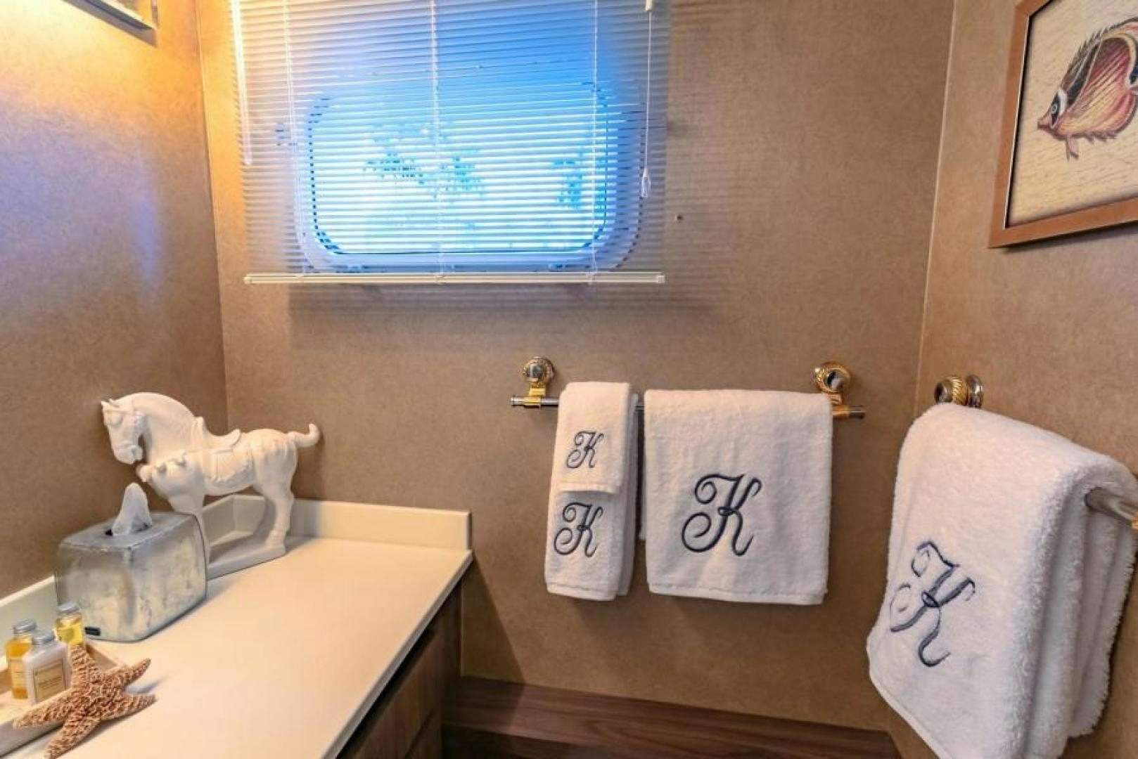 a cat on a towel rack aboard K Yacht for Sale