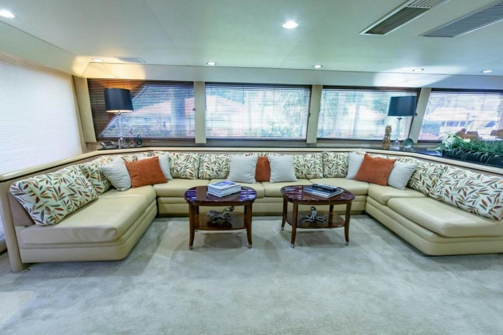 a living room with a couch and a coffee table aboard K Yacht for Sale