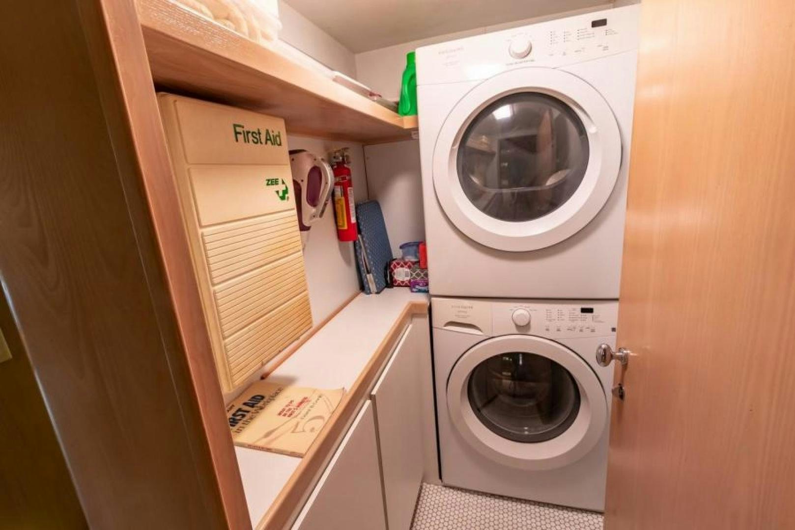a white washing machine aboard K Yacht for Sale