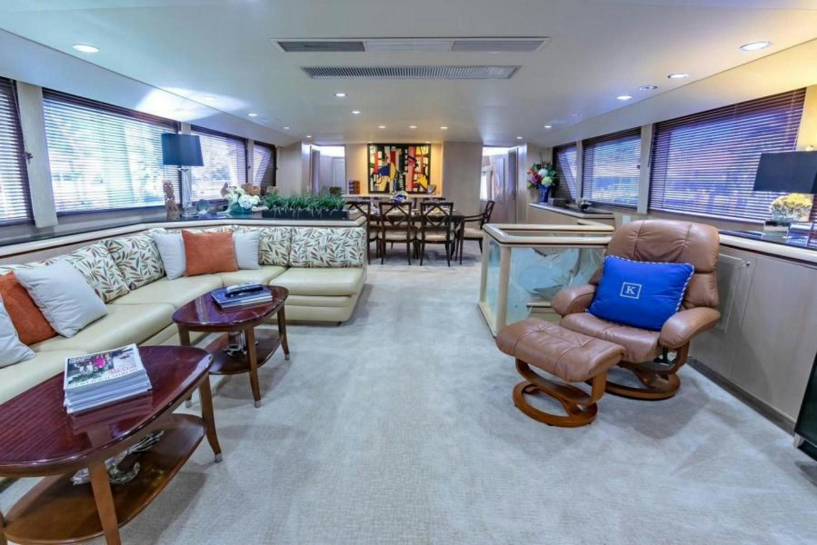 a living room with a couch and a table aboard K Yacht for Sale