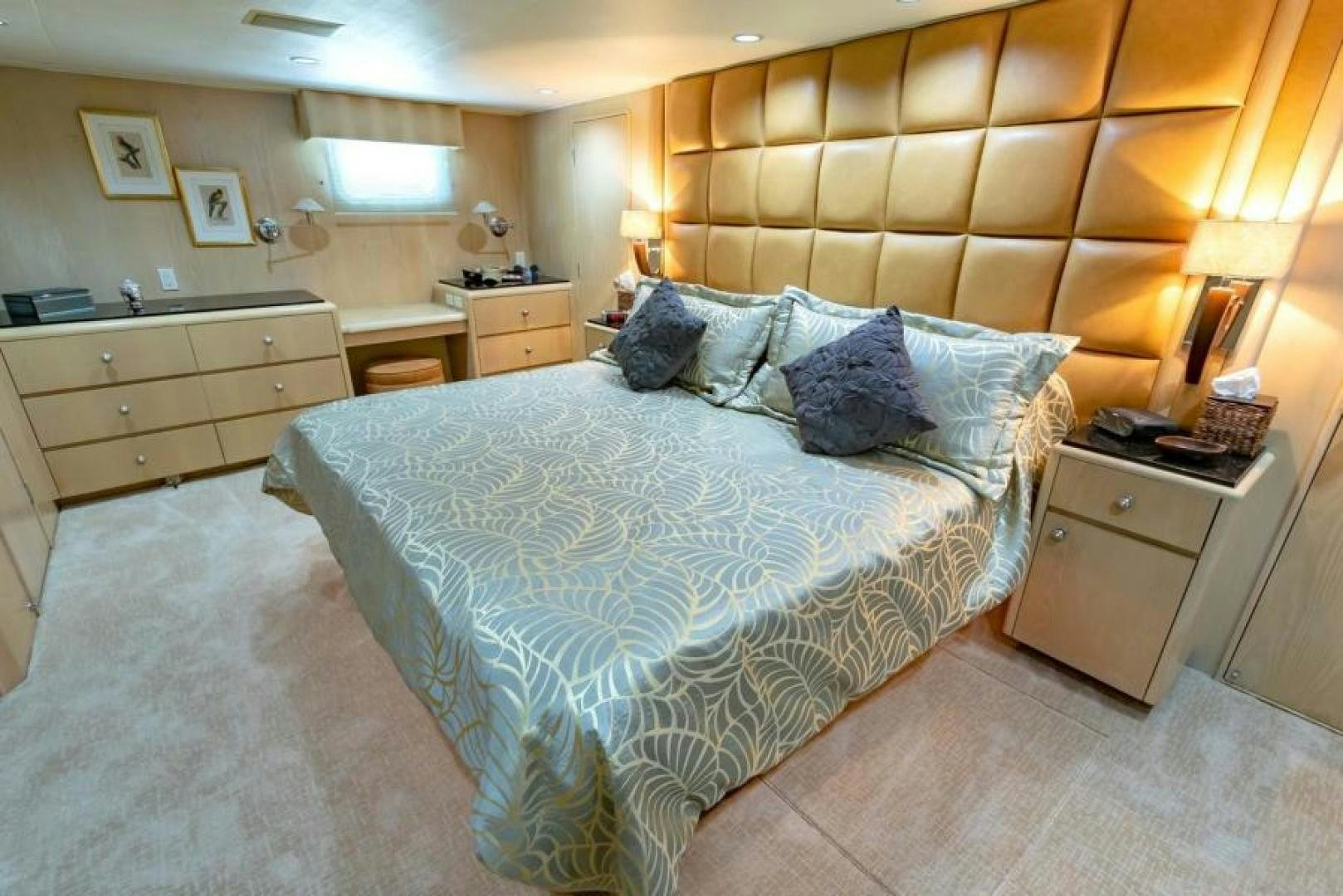 a large bed in a hotel room aboard K Yacht for Sale
