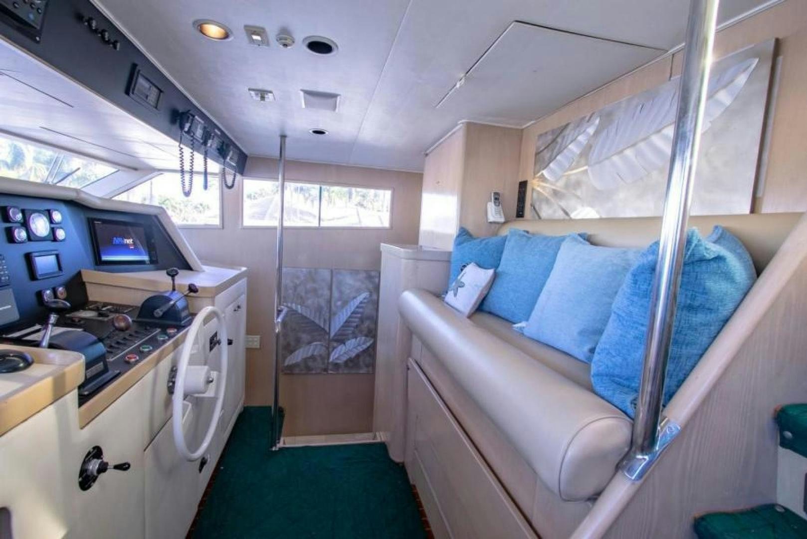 a room with a bed and a desk aboard K Yacht for Sale