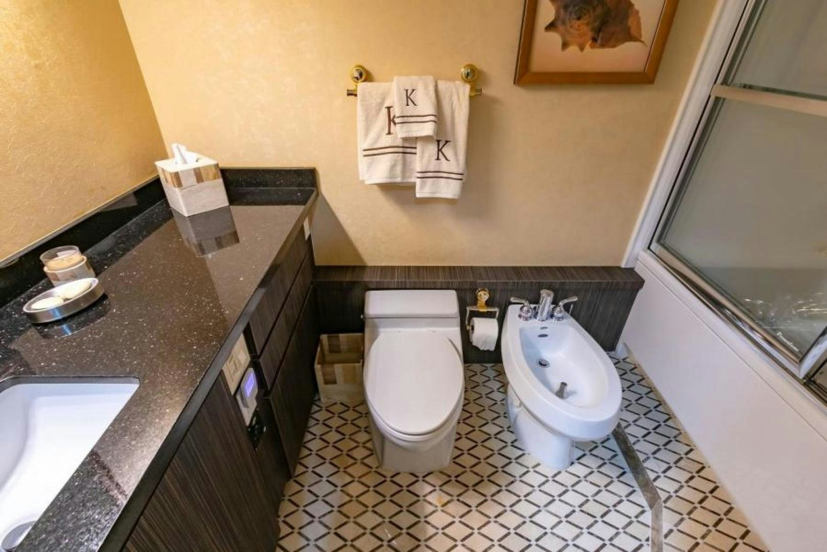 a bathroom with a toilet and sink aboard K Yacht for Sale