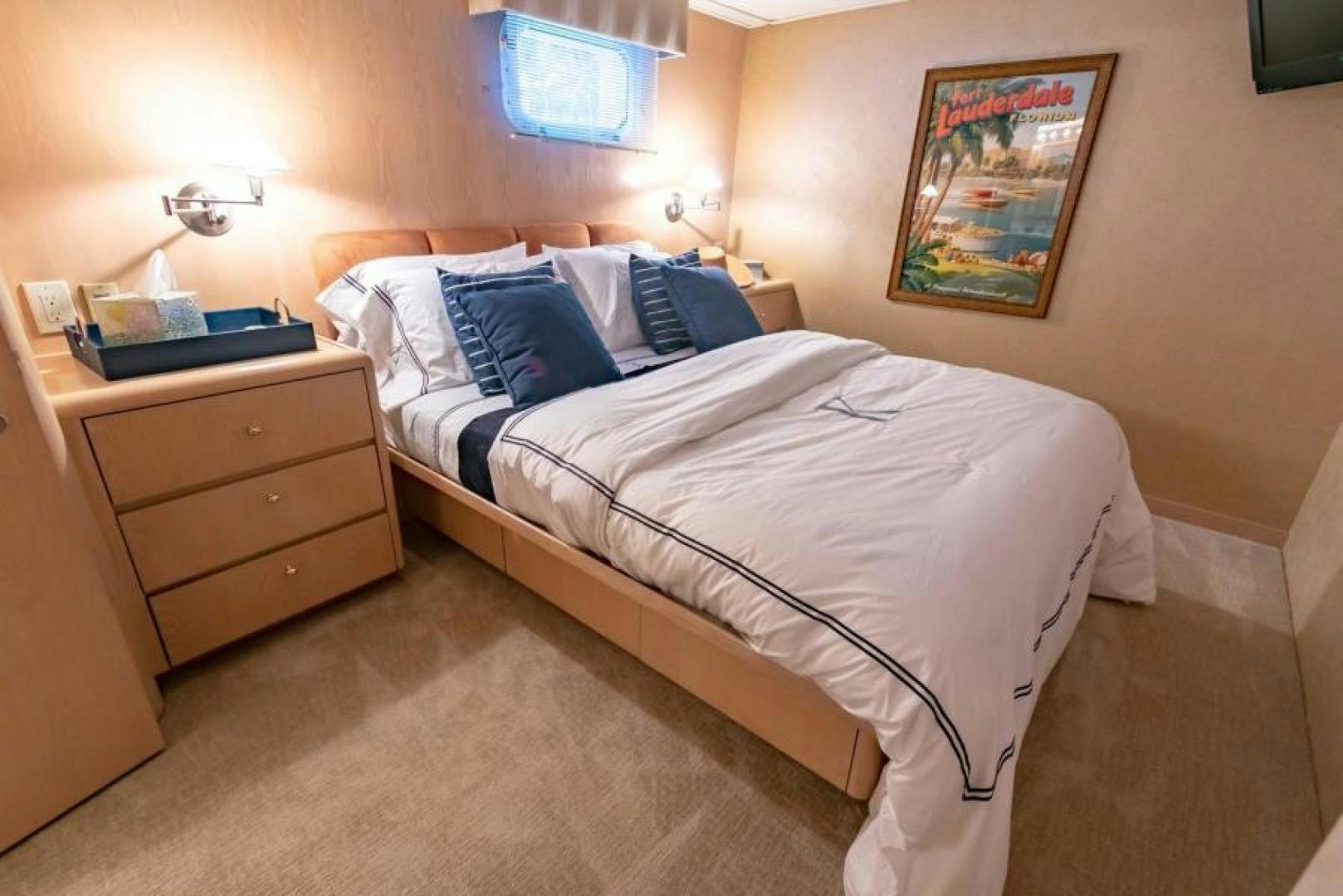 a couple of beds in a hotel room aboard K Yacht for Sale