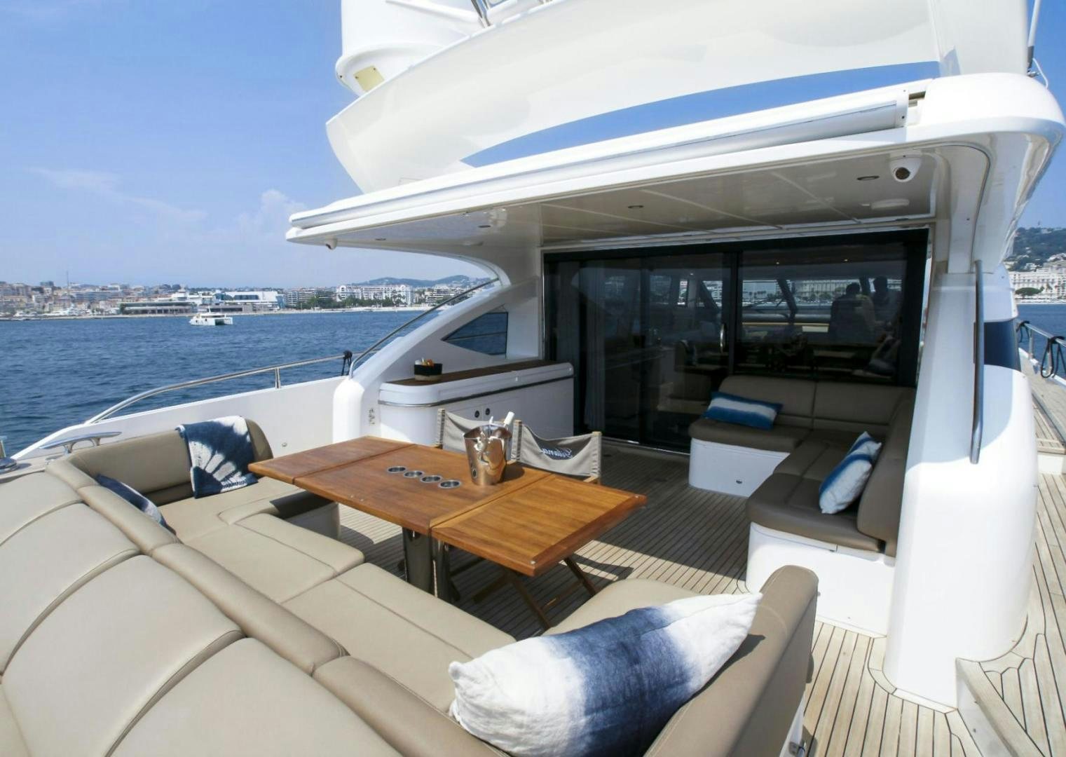 a room with a table and chairs aboard GITANA I Yacht for Sale