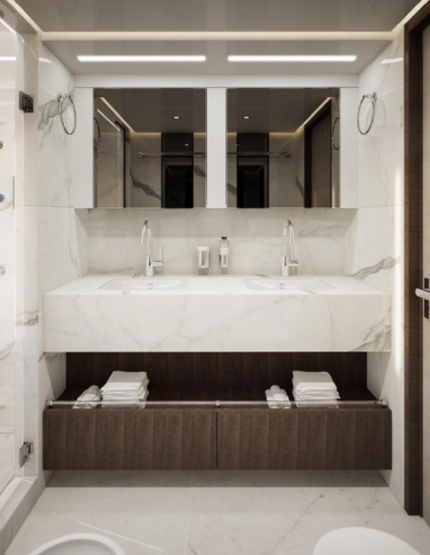 a bathroom with a sink and a mirror aboard KRISHH Yacht for Sale