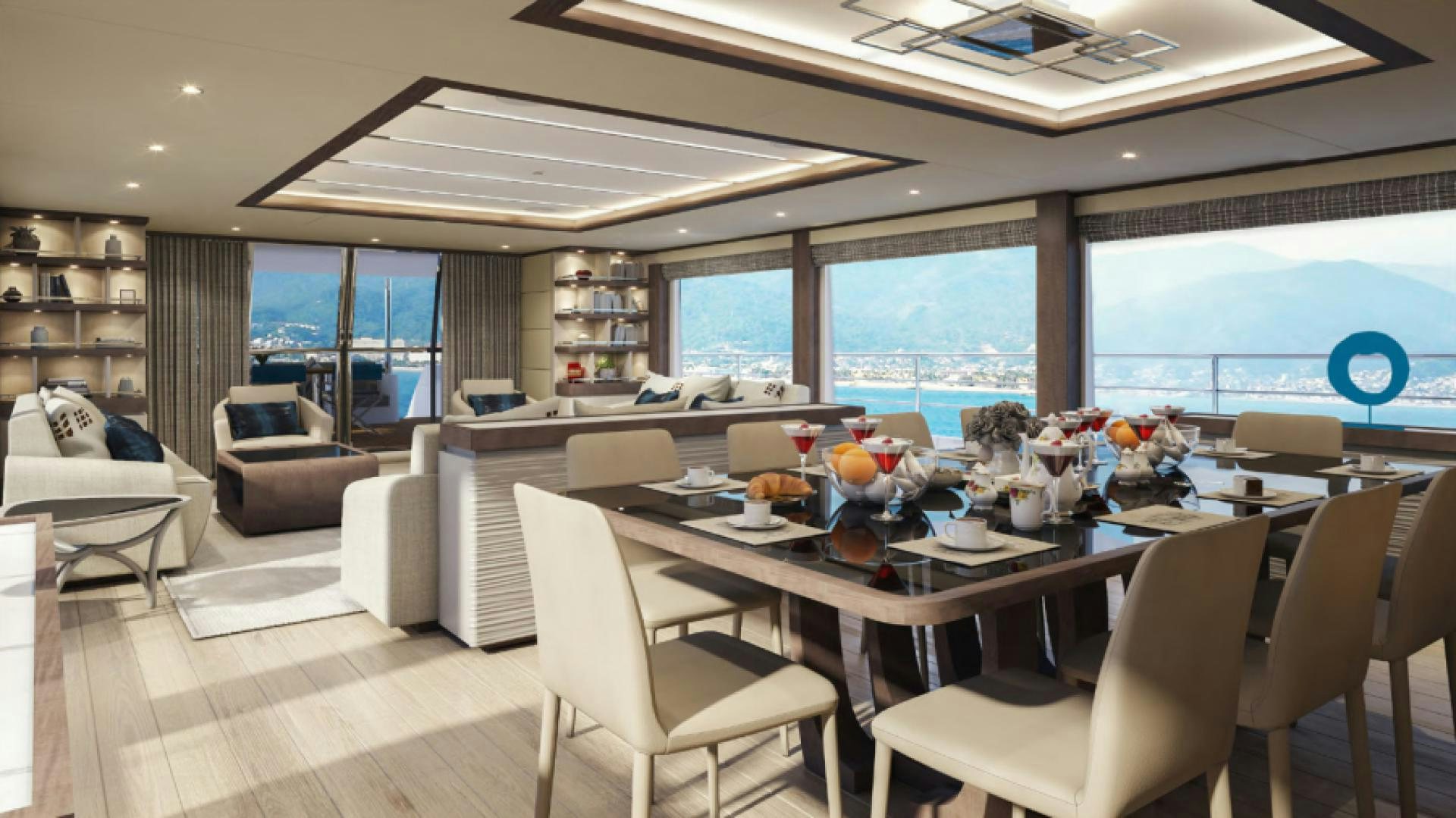 a large room with a table and chairs aboard KRISHH Yacht for Sale