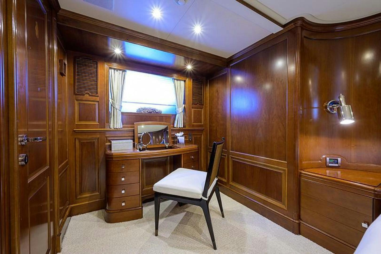 a room with a chair and a desk aboard BW Yacht for Sale