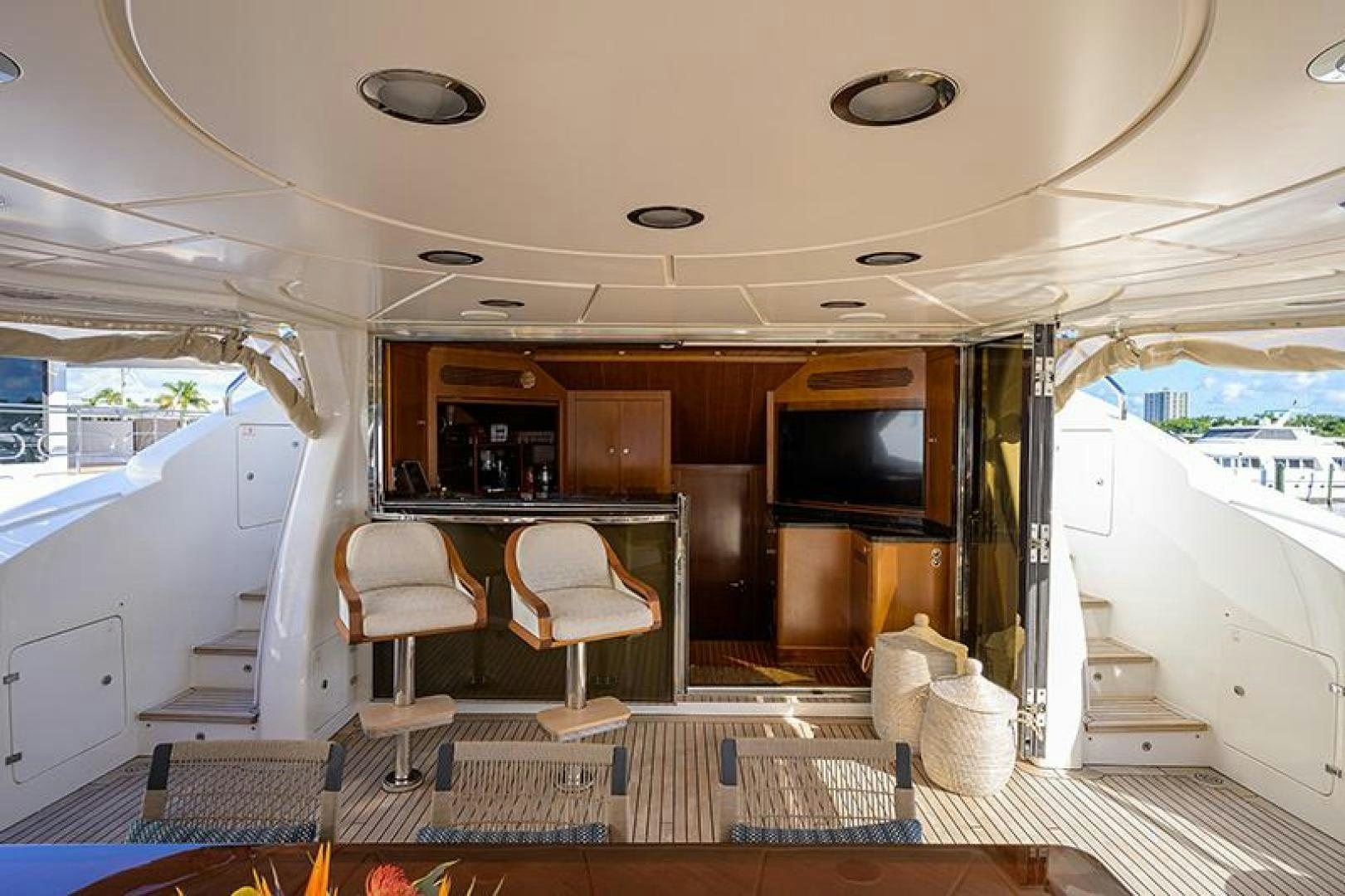 a room with a table and chairs aboard BW Yacht for Sale