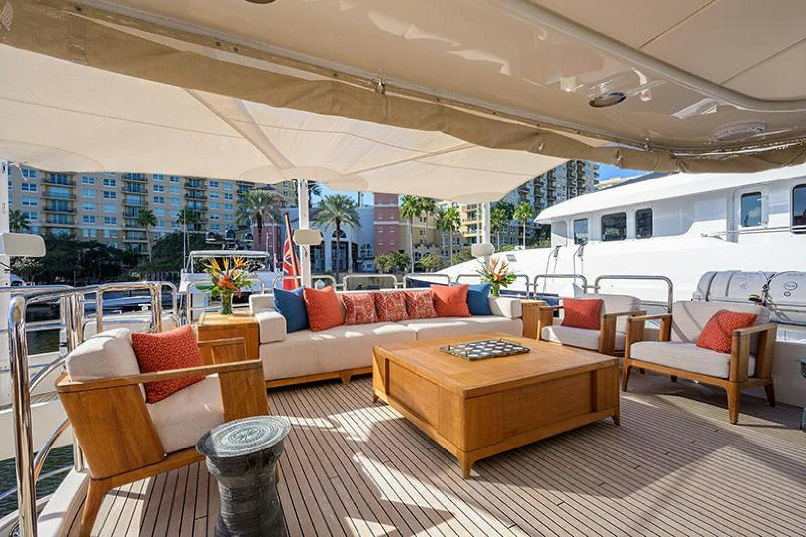 a living room with a large patio aboard BW Yacht for Sale