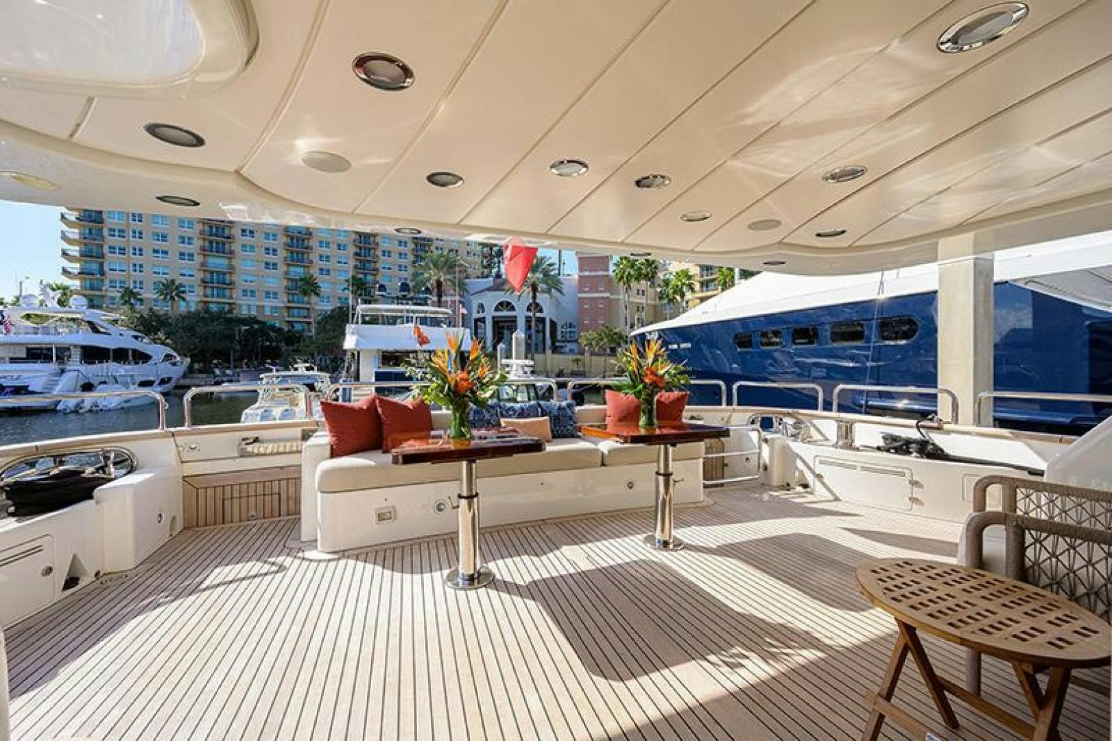a room with a table and chairs aboard BW Yacht for Sale