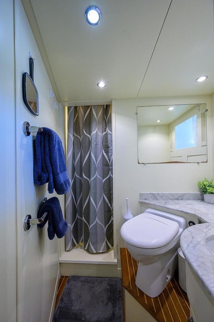 a bathroom with a sink and a mirror aboard BW Yacht for Sale